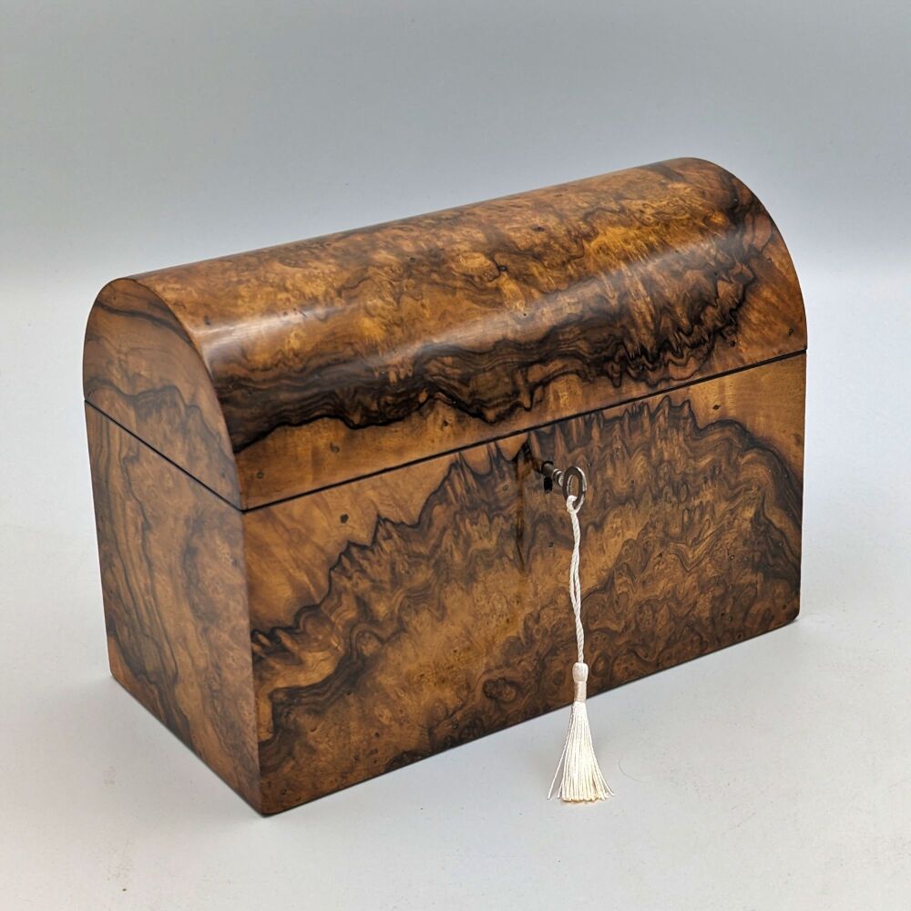 Victorian burr walnut dome topped stationery box.