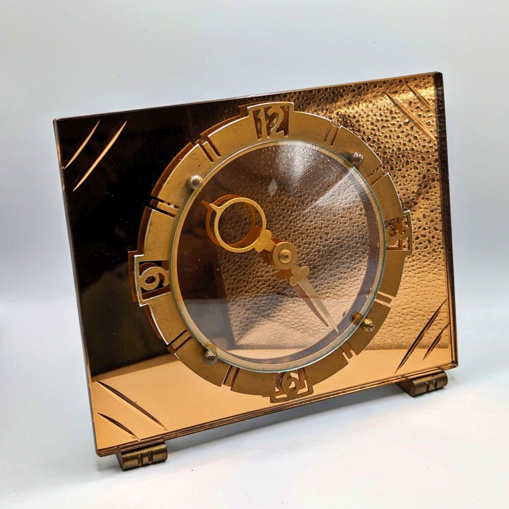 Art Deco copper/gold glass mantel clock.