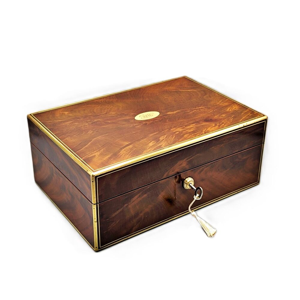 Fine flame mahogany dressing box by Mechi & Bazin.