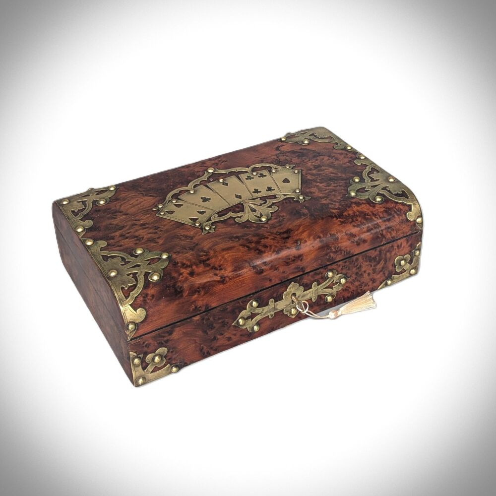 Victorian amboyna & brass games or trinket box.