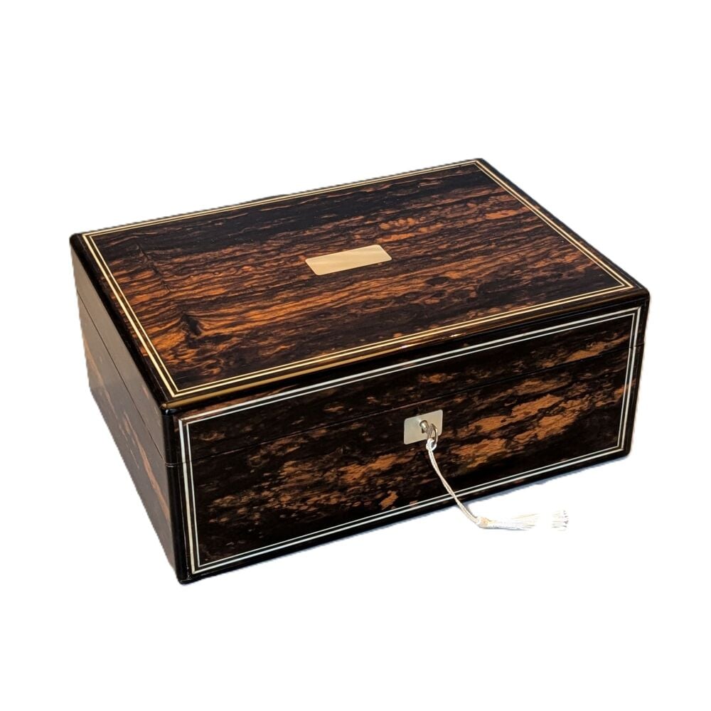 Superb coromandel jewellery/sewing box by Lund