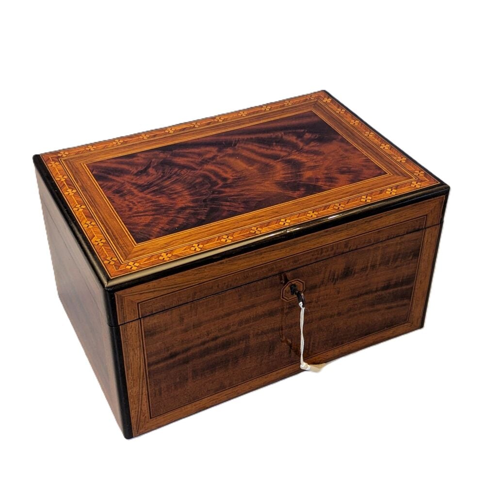 Fine late Victorian flame mahogany jewellery box