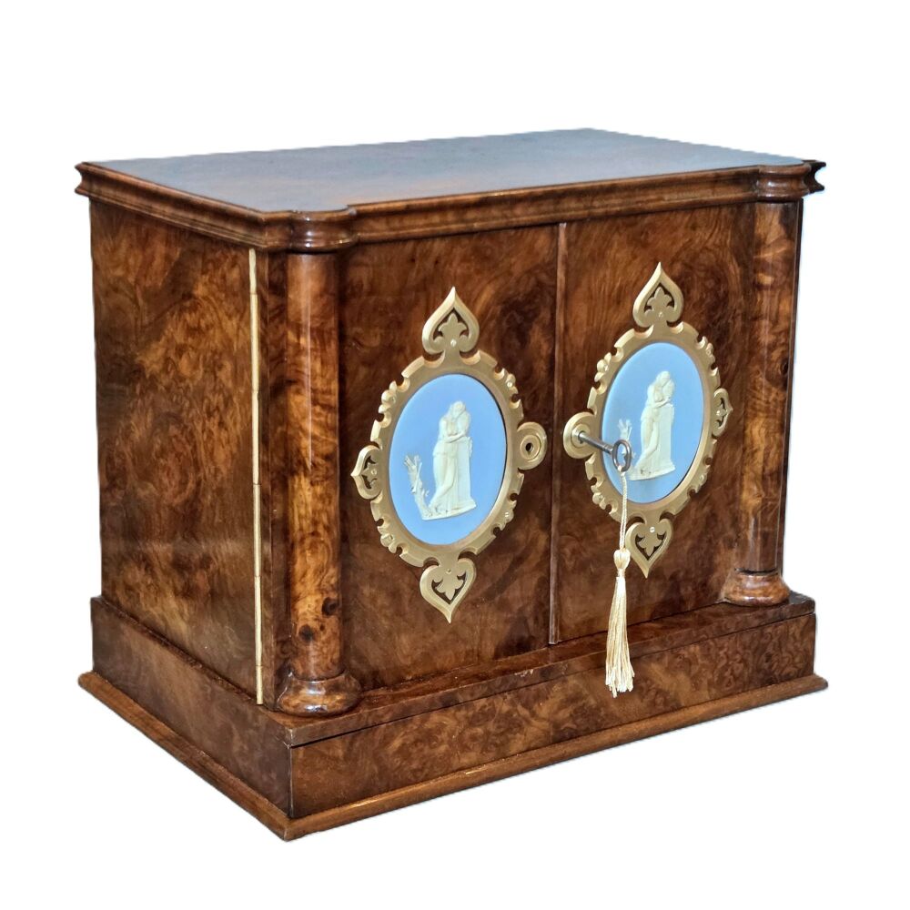 Exceptional large Victorian burr walnut table cabinet.