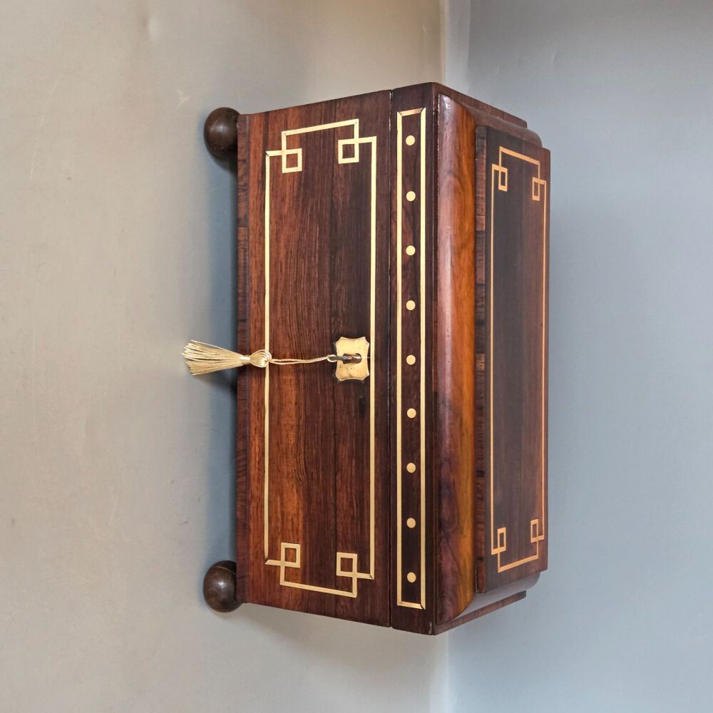 Regency brass inlaid rosewood tea caddy.