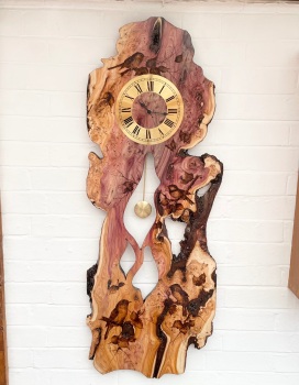 Rippled yew bird pendulum