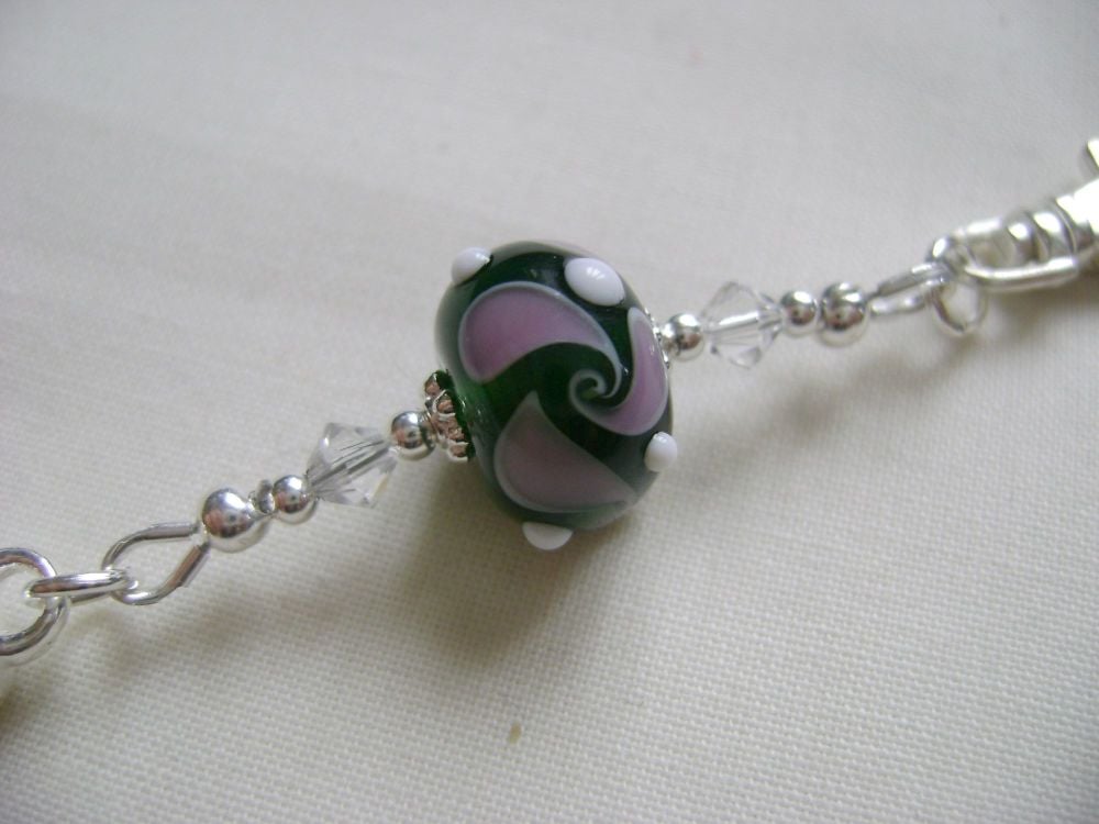 <!-- 004 -->Purple Swirl Stitch Marker Holder