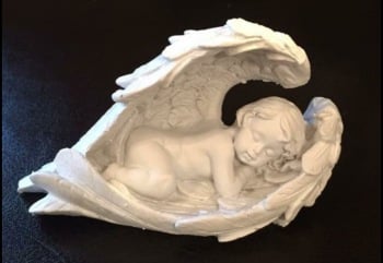small sleeping cherub in Angel wings 