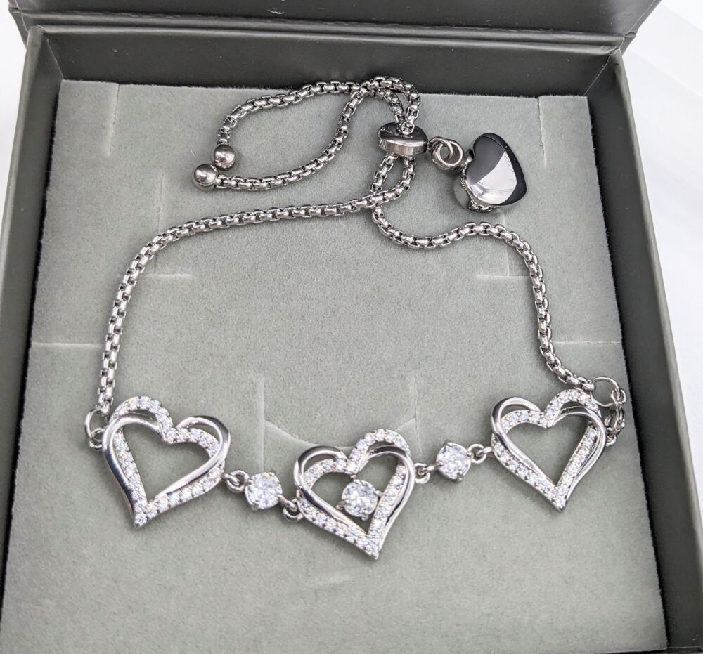 Stainless steel urn bracelet with diamonte hearts