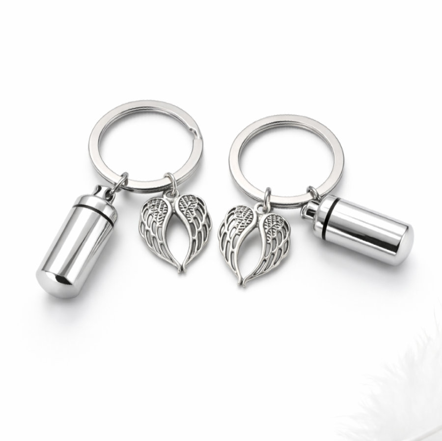 Stainless steel urn keyring with  your choice of charm - paw, angel wings, heart, engraved name tag