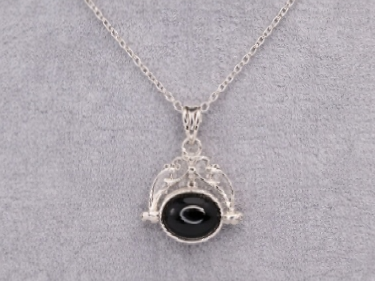 Solid silver traditional style double sided spinning fob