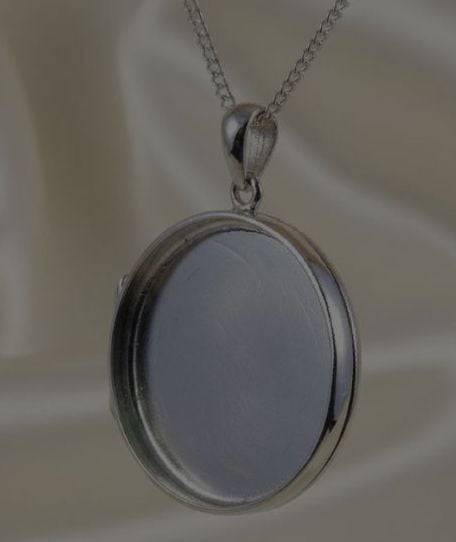 NEW!! Round Sterling Silver  locket - INTRODUCTORY PRICE - 1 AVAILABLE (rrp &pound;145.00)