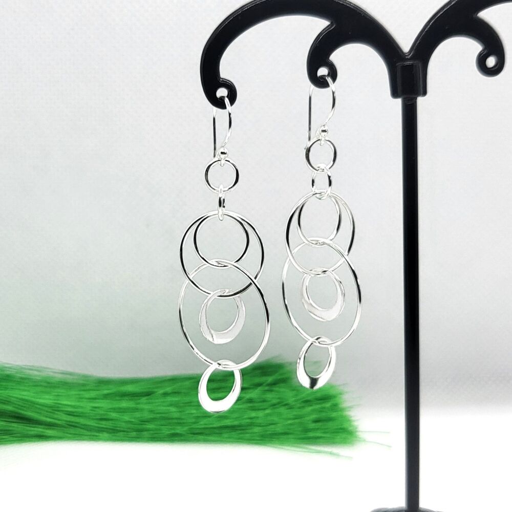 925 Sterling Silver Interlocked Various Sized Hoops Dangle Earrings