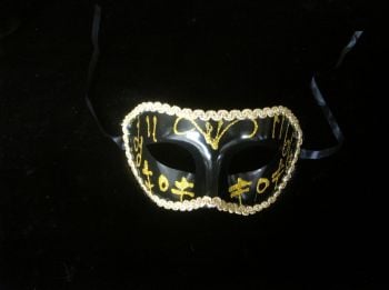 Black Romanesque masquerade mask with gold swirls