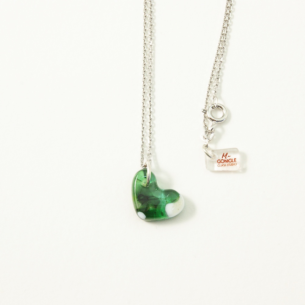 Hand carved Heart in greens on silver