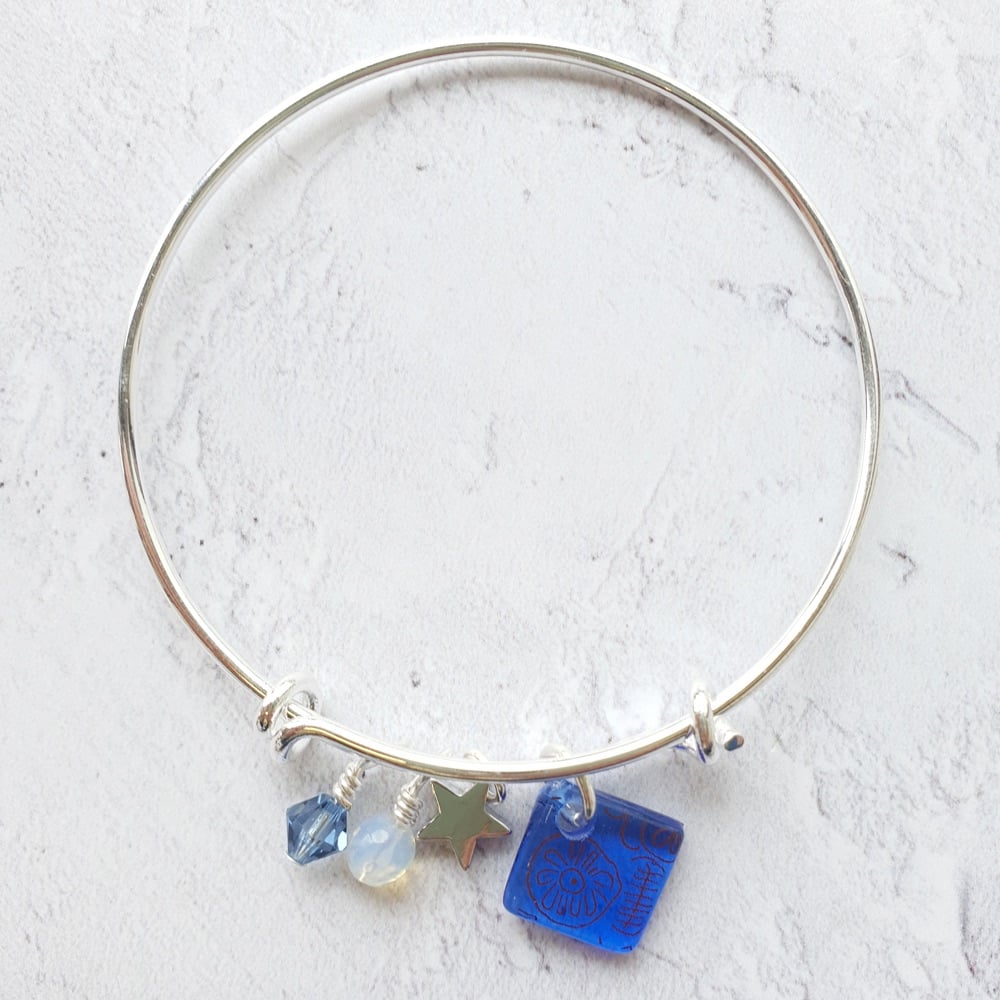 Blue neo bangle on silver