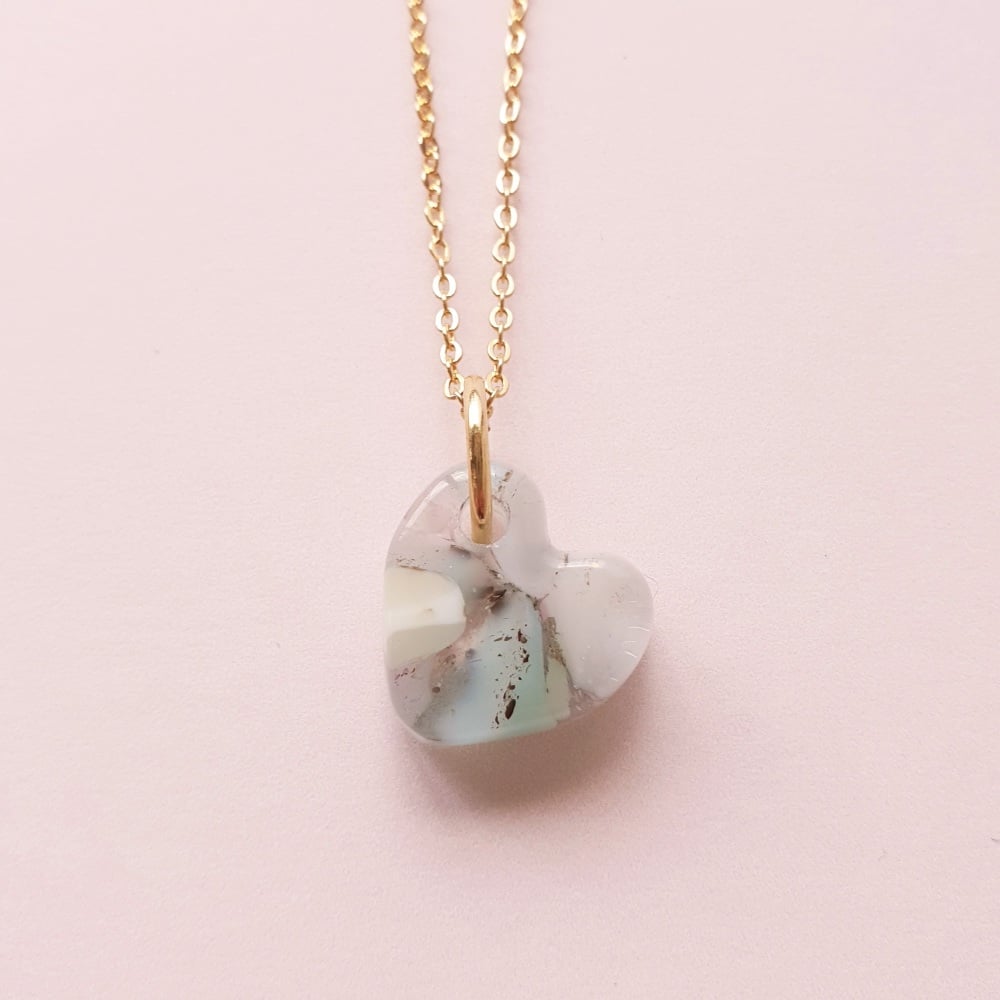 Pastel glass heart on gold