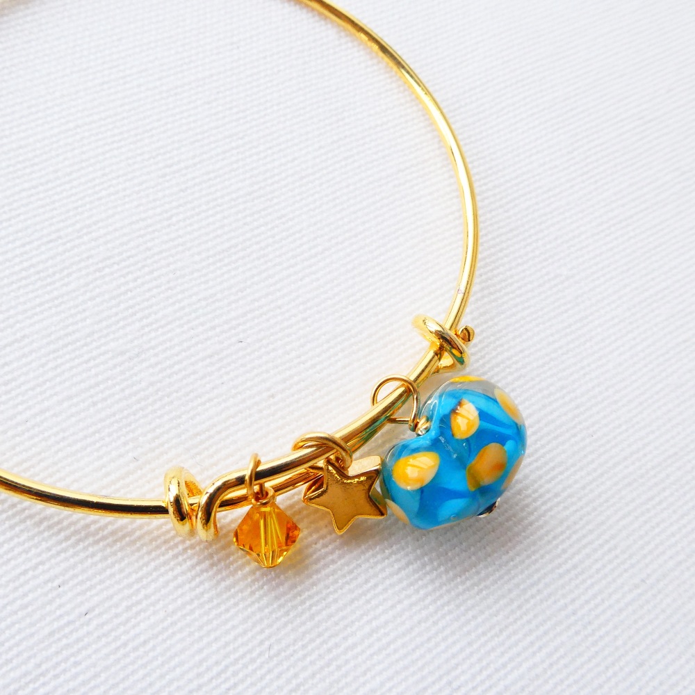 Blue and yellow glass Heart On a 14K Gold Plated Bangle