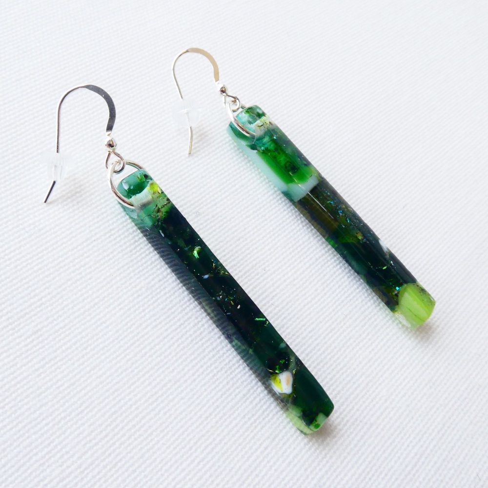Emerald glass pillar earrings on silver