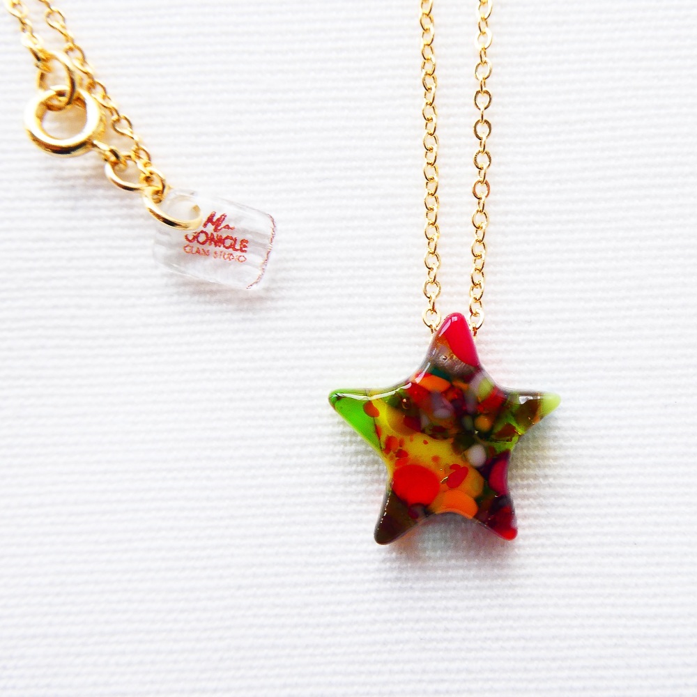 Gold shooting star in multicolours
