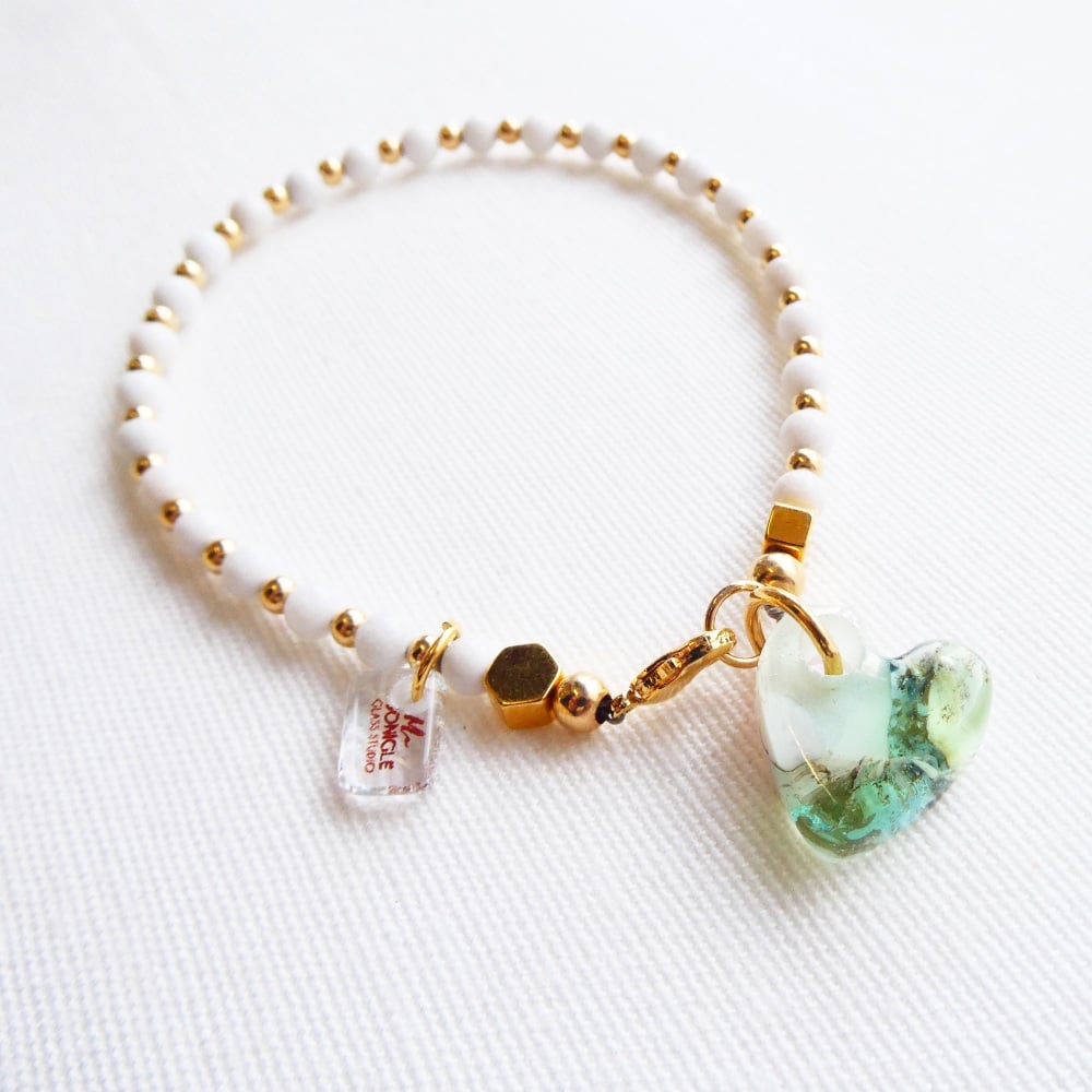 Handcarved glass heart bracelet with mountain jade gemstones and gold fille