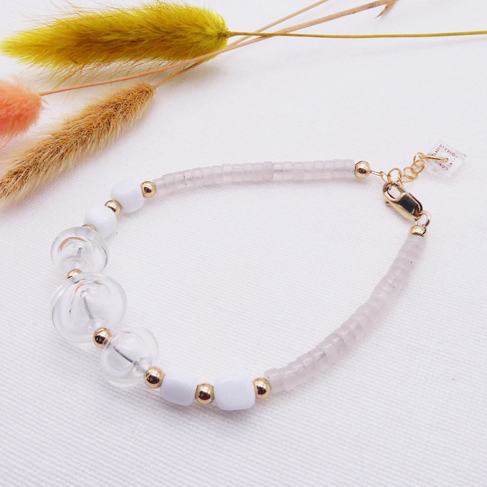 Clear bauble bead Bracelet with rose quartz gemstones.