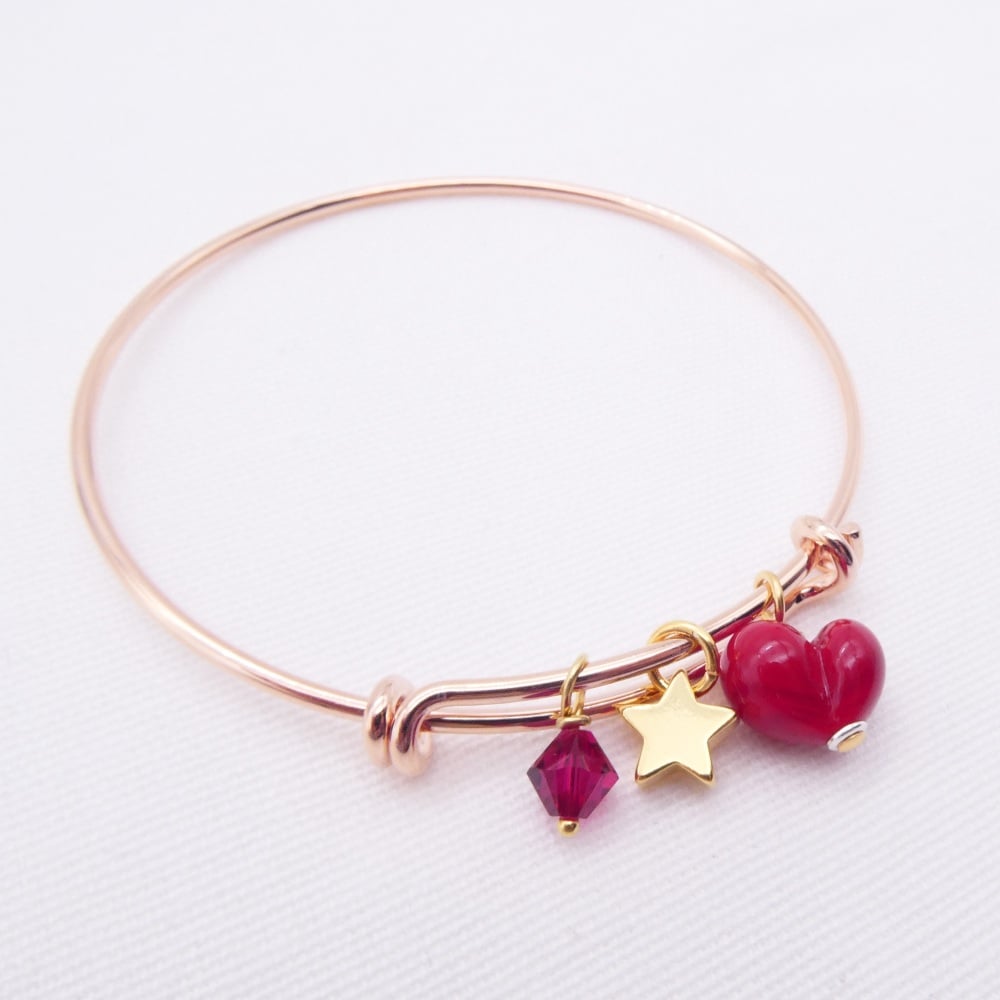 Red glass Heart On a rose gold Plated Bangle
