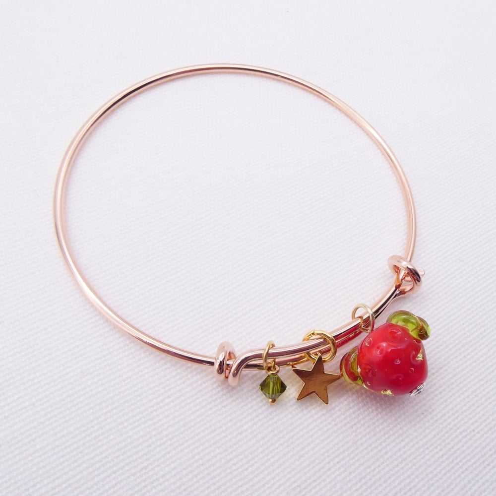 Glass strawberry On a rose gold Plated Bangle
