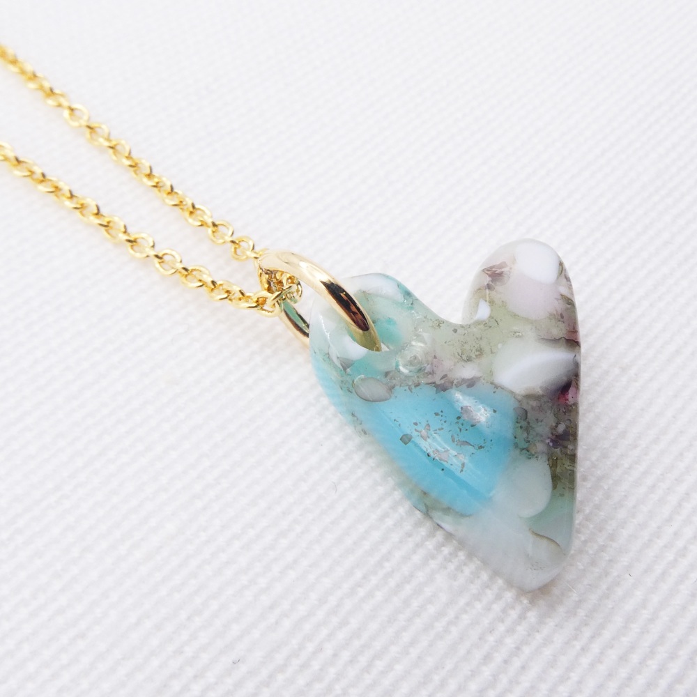 Pastel glass heart on gold