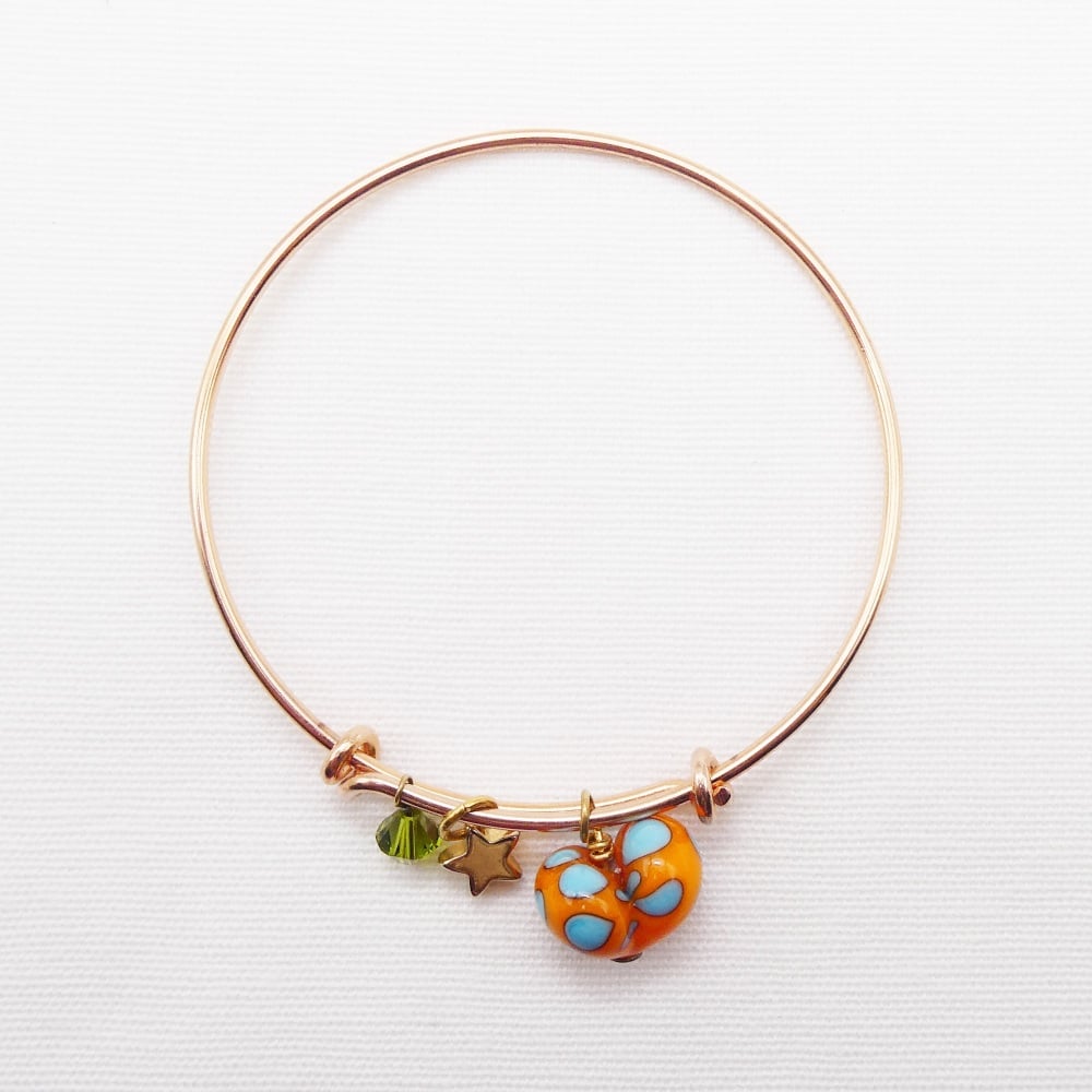 Orange and turquoise glass Heart On a rose gold Plated Bangle