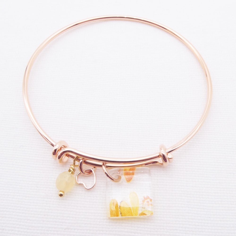 Clear floral Glass Tile On a Rose Gold Plated Bangle -Yellows