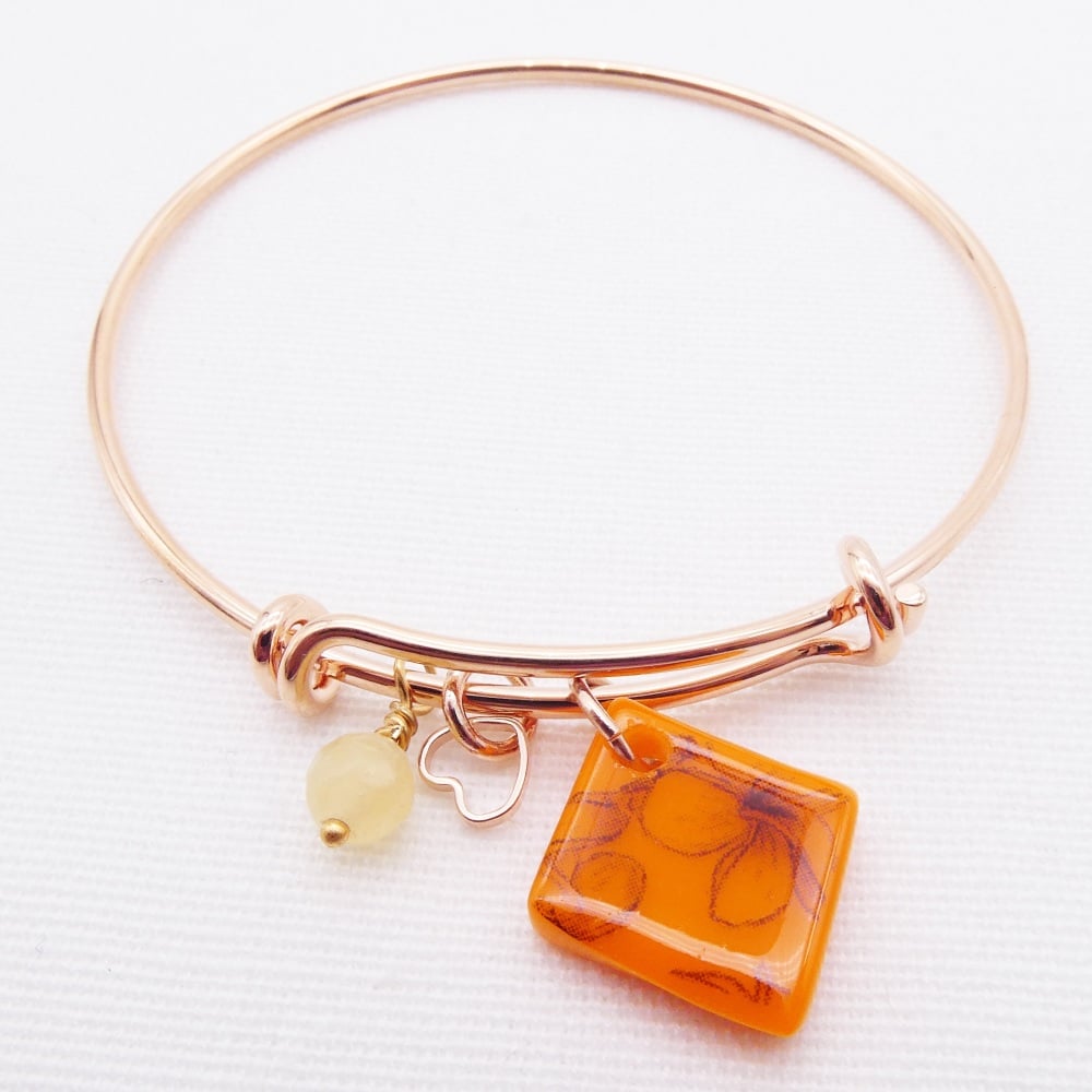 Orange floral Glass Tile On a Rose Gold Plated Bangle