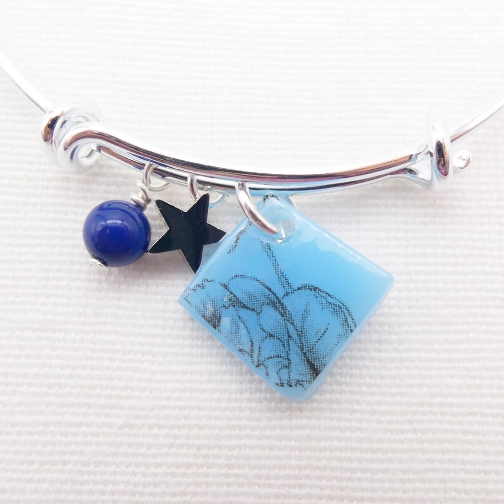 Powder Blue Floral drawing Glass Tile On a Silver Plated Bangle