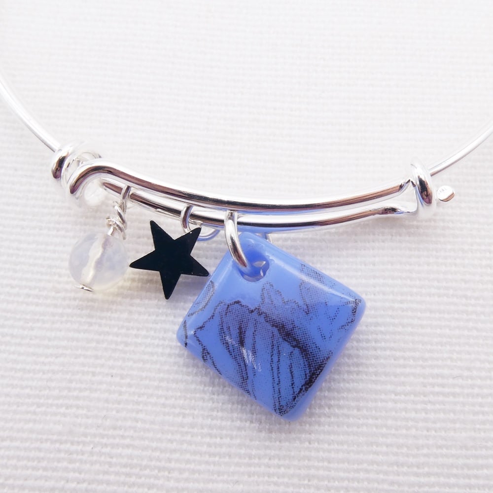 Powder Blue Floral drawing Glass Tile On a Silver Plated Bangle