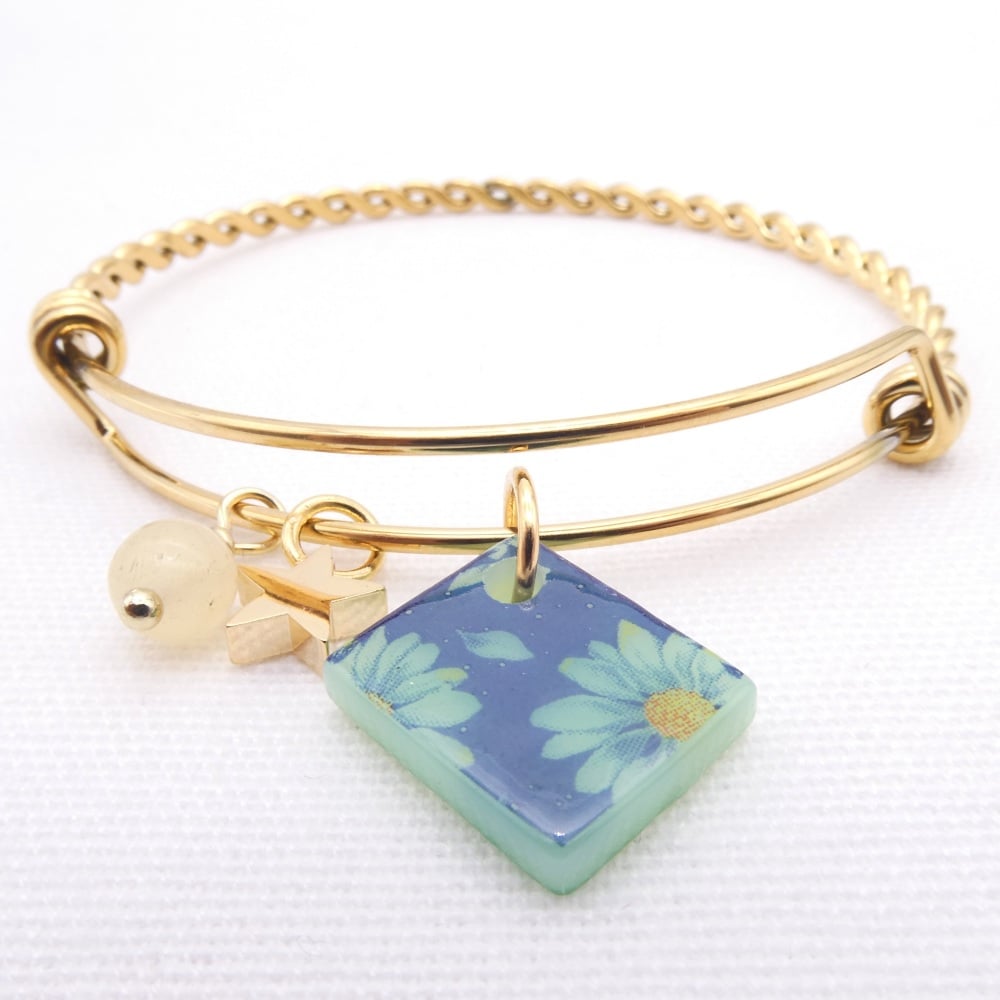 Mint Green and blue daisy Glass Tile On a Gold Plated Twisted Bangle