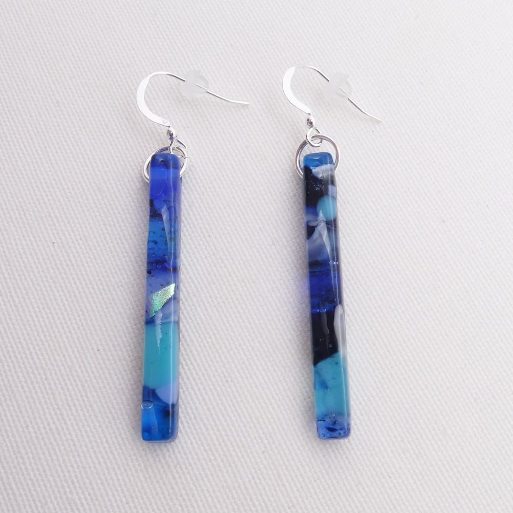 Blue glass pillar earrings on silver