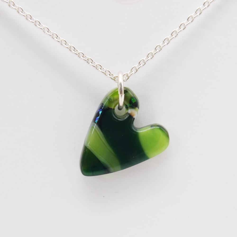 Green glass heart on silver #1