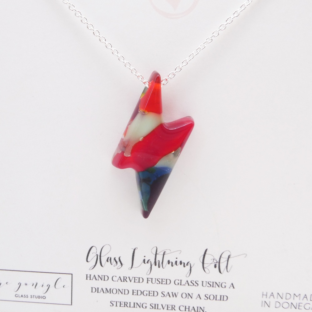 Multicoloured lightning bolt on silver