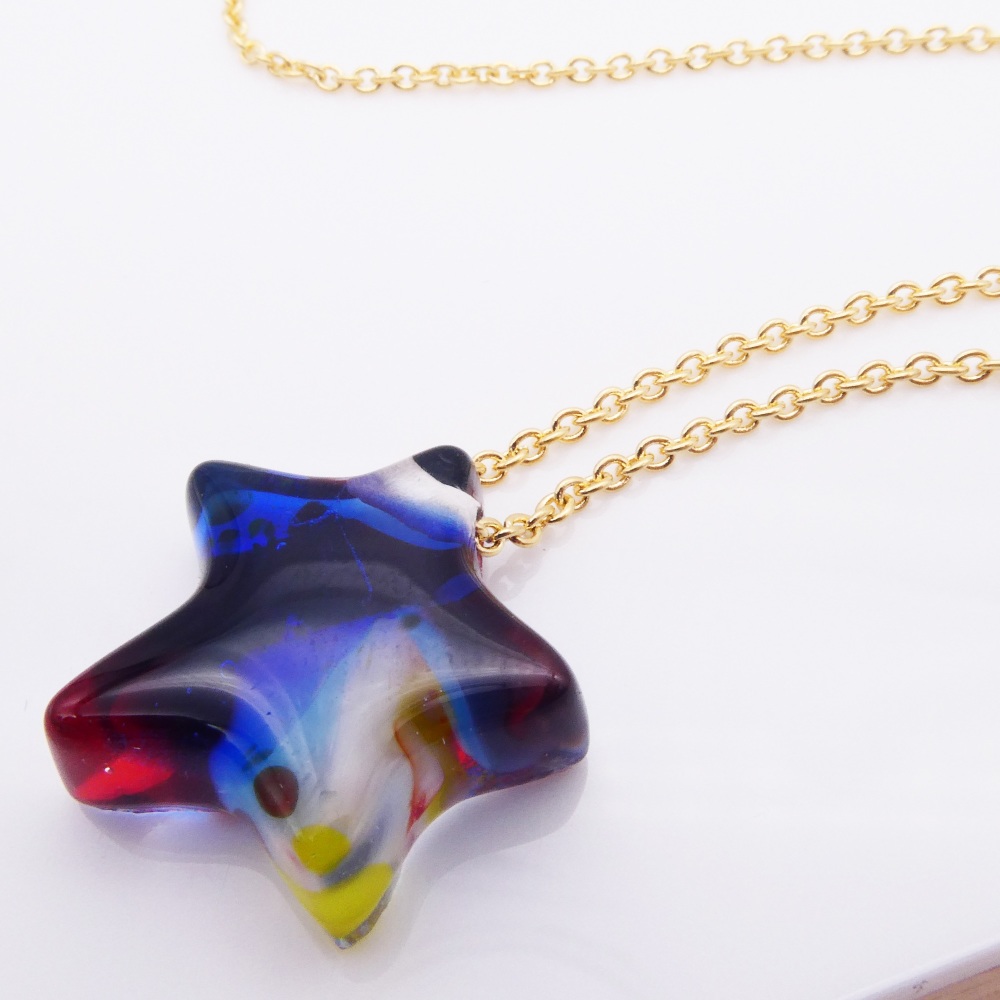 'Nebula' A Glass star on gold