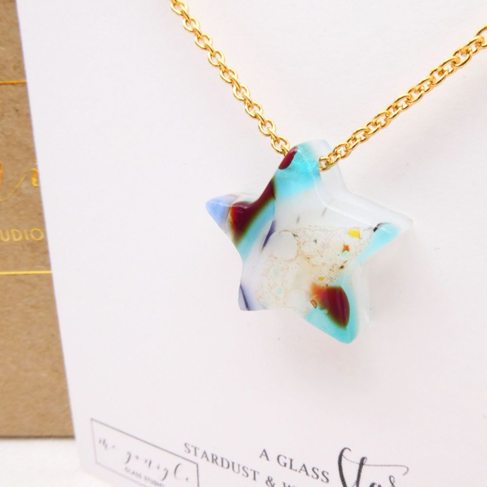 'Neptune' A Glass star on gold