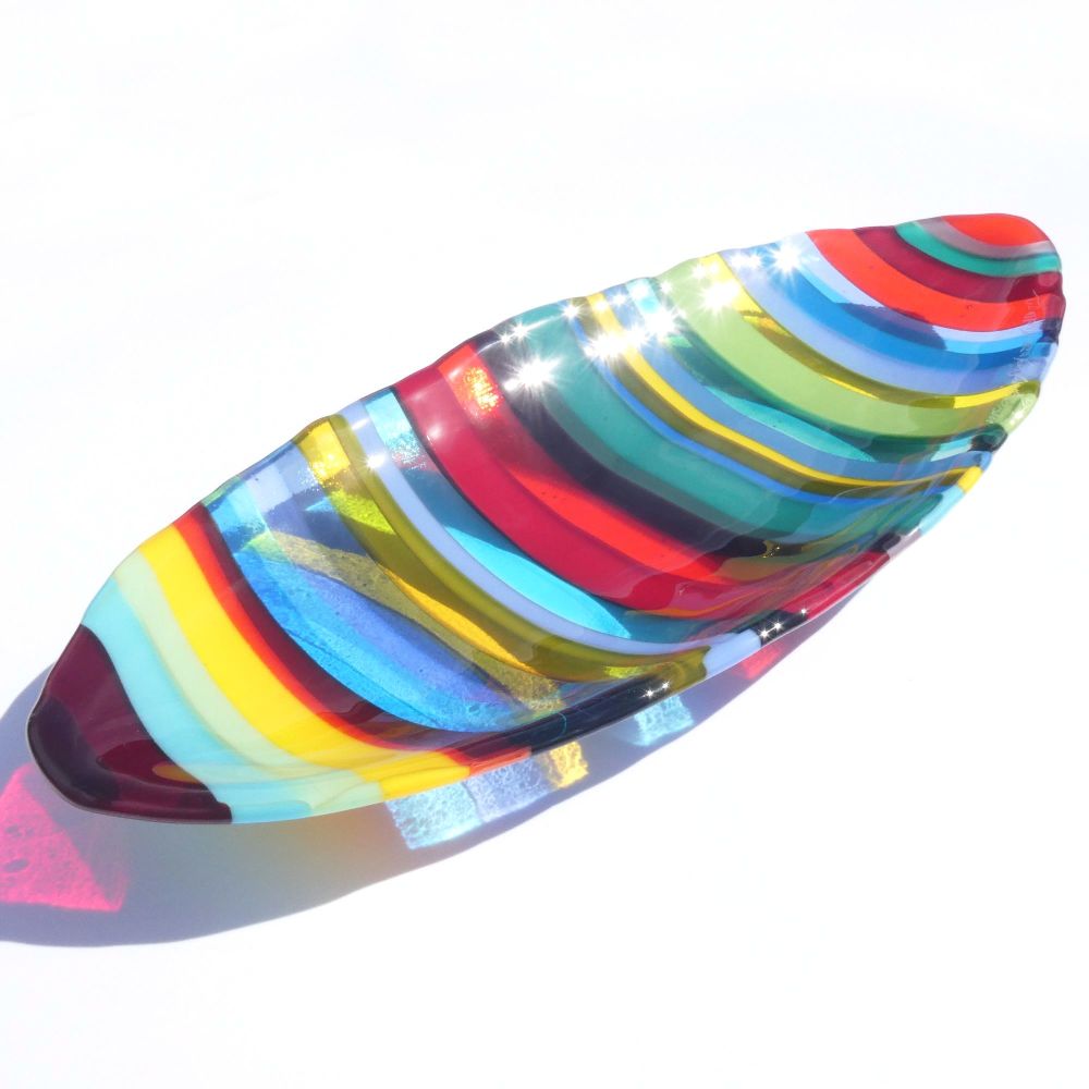 Large fused glass boat bowl in multicoloured stripes