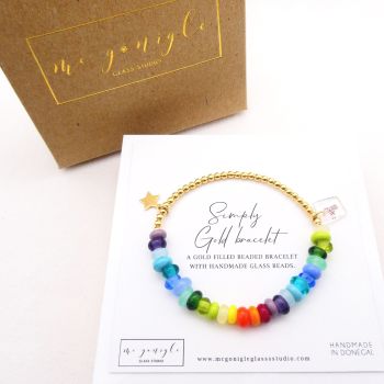 Multicoloured glass beads with gold filled star charm on a Gold Filled bracelet