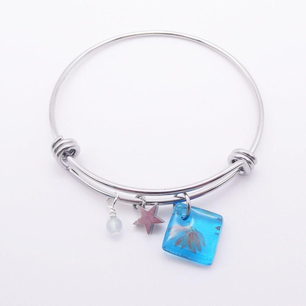 Transparent Blue Floral Glass Tile  On a Silver Plated Bangle 