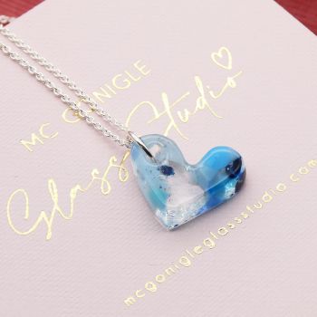 Clear and Blue glass heart on silver