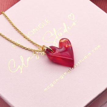 Red glass heart on a gold filled necklace