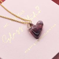 Purple glass heart on a  gold filled necklace