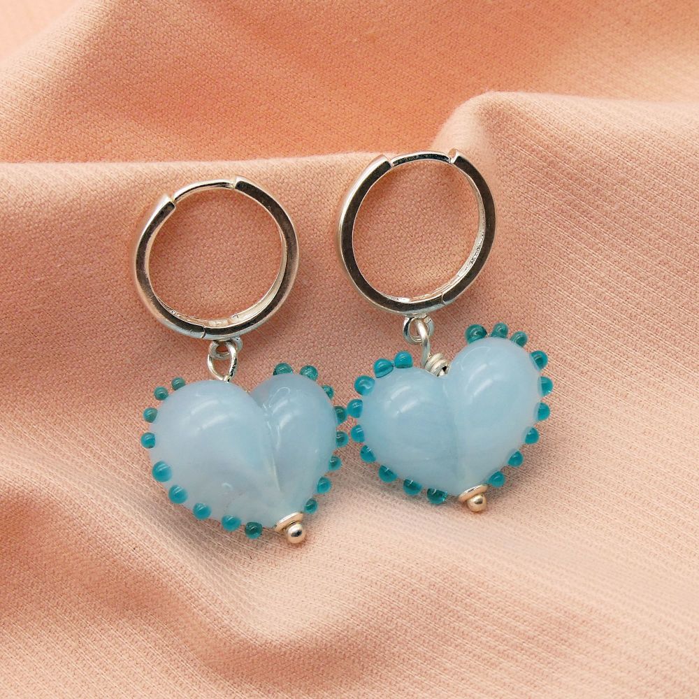 Pastel Blue and turquoise dotty Glass Heart earrings on silver hoops