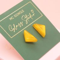 Yellow geo studs