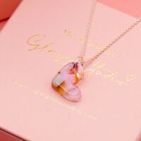 Pastel glass heart on silver