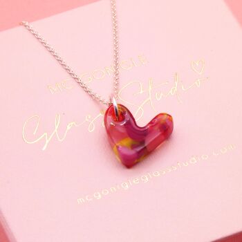Multicoloured red glass heart on silver