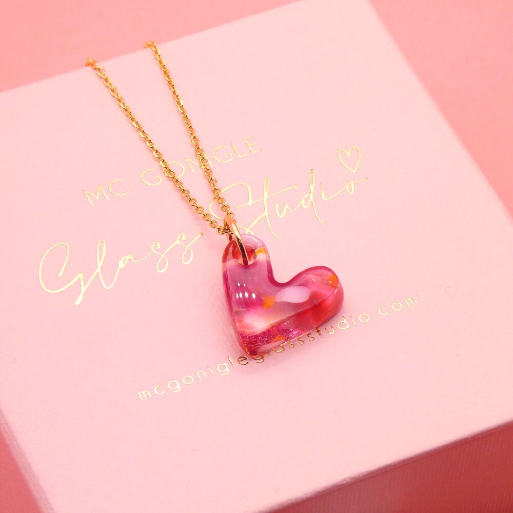 Pinks glass heart on a gold filled chain